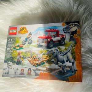 Lego Red Building Set with Dinosaur and Off-Road Vehicle